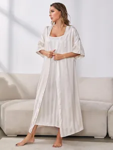 Full view of elegant white striped silk robe and camisole nightgown two-piece loungewear set