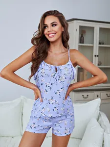 Front view of a light blue floral print camisole and shorts pajama set for women