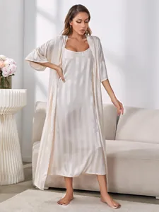 Elegant champagne striped silk satin two-piece pajama set featuring a robe and nightgown