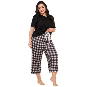 Plus size women's loungewear set with black t-shirt and heart checkered pants