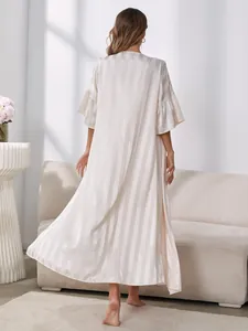 Elegant champagne striped silk robe for women, featuring ruffled sleeves, shown from the back
