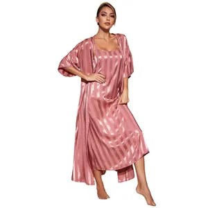 Detail shot of a pink striped silk nightgown and robe two-piece pajama set for women