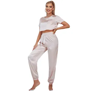Detailed view of the pink ice silk short sleeve pajama set with joggers for women
