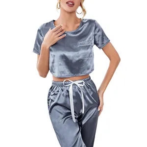Women's two-piece satin pajama set with short sleeve crop top and drawstring joggers
