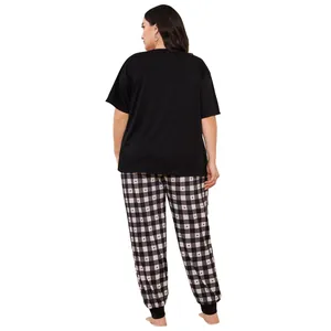 Back view of plus size women's pajama set featuring black t-shirt and checkered heart pants
