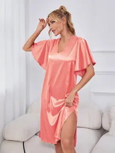 Coral pink satin nightgown featuring V-neck, flutter sleeves and sexy side slit detail.