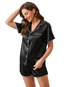 Full detail view of women's black silk-like satin pajama set with short sleeves