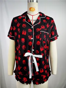 Women's two-piece black pajamas set with red gift box print and white bow