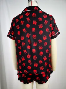 Back view of short-sleeved pajama set featuring red gift box print on black