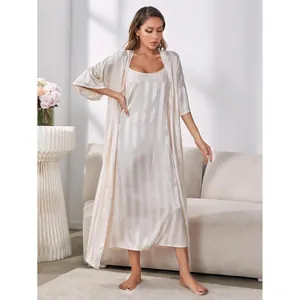Elegant champagne silk pajama set featuring a striped nightgown and a matching long robe