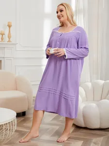 Detail of plus size lavender nightgown with delicate lace trim and button neckline