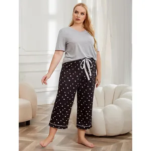 Comfortable women's plus size loungewear set with short sleeve top and heart pants