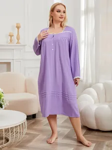 A full-length view of a elegant purple plus size nightgown with delicate lace trim