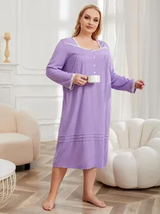 Close-up of purple plus size nightgown with white lace trim and button-front detailing