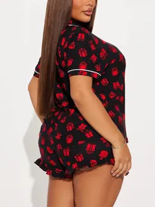 Detailed back view of women's short sleeve pajama set featuring festive red gift box prints