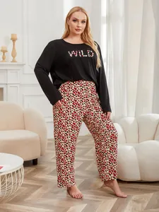 Plus size black long sleeve pajama set with leopard print pants and wild graphic