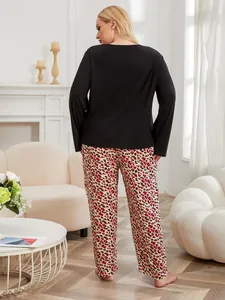 Rear view of women's plus size long sleeve pajama set with leopard print pants