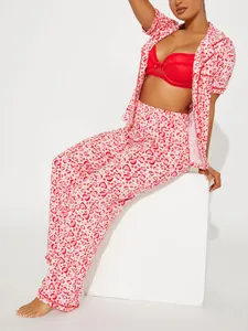 Detailed view of red heart print pajamas for women, soft summer sleepwear set.