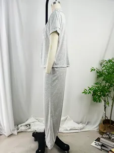 Side profile of women's heather grey pajama set featuring short sleeves and long pants