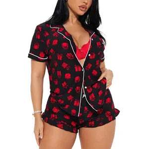 Elegant women's black two-piece pajama set featuring festive red gift box prints