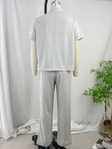 Detailed back view of a grey short sleeve pajama top and long pants set for women