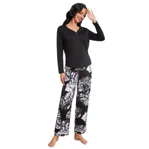 Elegant women's long sleeve black top and floral print pajama pants loungewear set