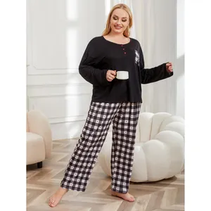 Cozy plus size women's black long-sleeve pajama set with heart-print plaid pants