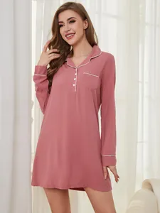 Elegant long-sleeved mauve nightgown featuring contrast piping and button-down collar.