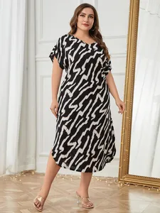 Full-body view of plus size short sleeve nightgown with abstract lightning pattern