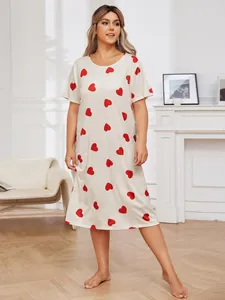 Comfortable plus-size beige nightgown featuring a cute red heart print and short sleeves.
