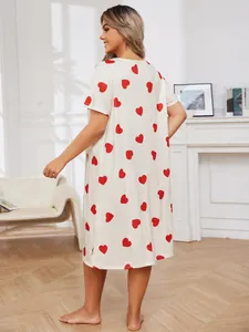 Back view of plus size white nightgown with red heart print and short sleeves detail.
