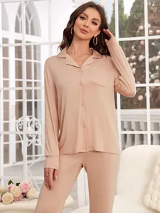 Detailed view of women's soft modal pajama set in apricot with button-down shirt