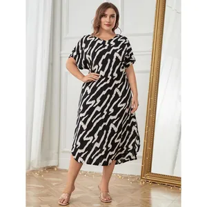 Elegant plus size short sleeve midi nightgown with black and white geometric print.