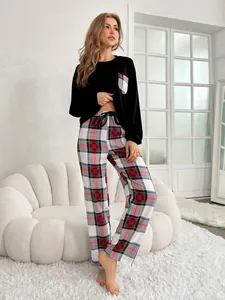 Women's cozy two-piece long sleeve pajama set featuring classic red plaid pants design