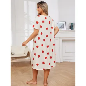 Comfortable plus size short sleeve nightgown with red heart print in a cozy home setting