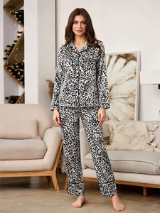 Women's leopard print pajama set with long sleeves and pants in soft satin finish