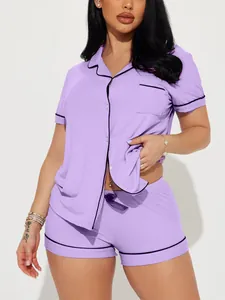 Detail shot of purple ribbed short-sleeved pajama set with elegant black piping