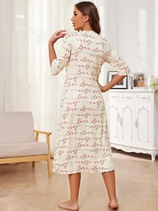 Back view of a comfortable short-sleeve women's nightdress with heart and letter prints