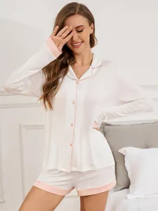 Full view of comfortable white modal pajama set with pink trim for women loungewear