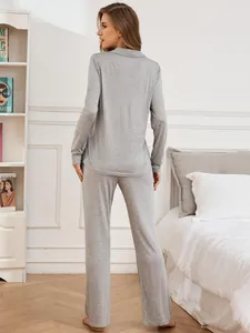 Detailed rear view of soft gray modal long-sleeved pajamas set for women in bedroom.