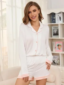 Elegant women's white modal pajama set with pink contrast trim long sleeve shirt and shorts