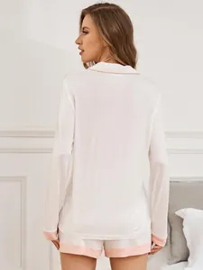 Detailed back view of women's soft modal two-piece pajama set with elegant pink trim