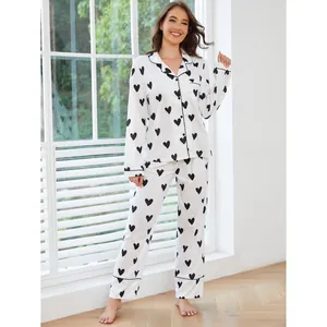 Classic women's two-piece heart print pajama set featuring long-sleeved shirt and long pants