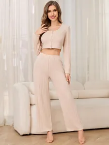 Full view of women's ribbed two-piece lounge set with cropped cardigan and wide-leg pants