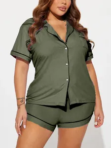 Detailed view of women's olive green ribbed pajama set with short sleeves and shorts.