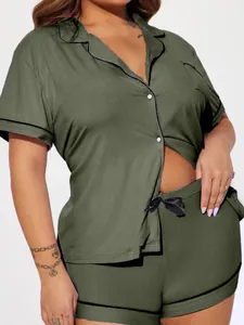 Detailed view of women's ribbed pajama set in olive green featuring lapel collar and shorts
