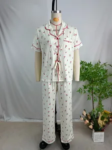 Two-piece women's cherry print pajama set with short sleeve lapel shirt and long pants