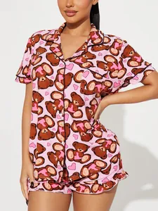 Detail view showing the cute pink cartoon bear print on this soft summer pajama set