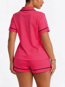 Back view of pink pajama set with black piping detail for women's loungewear