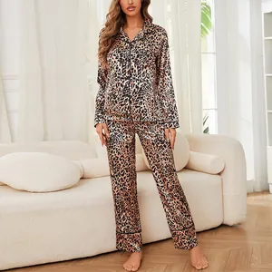 Elegant leopard print silky pajama set featuring long sleeves and a classic lapel collar